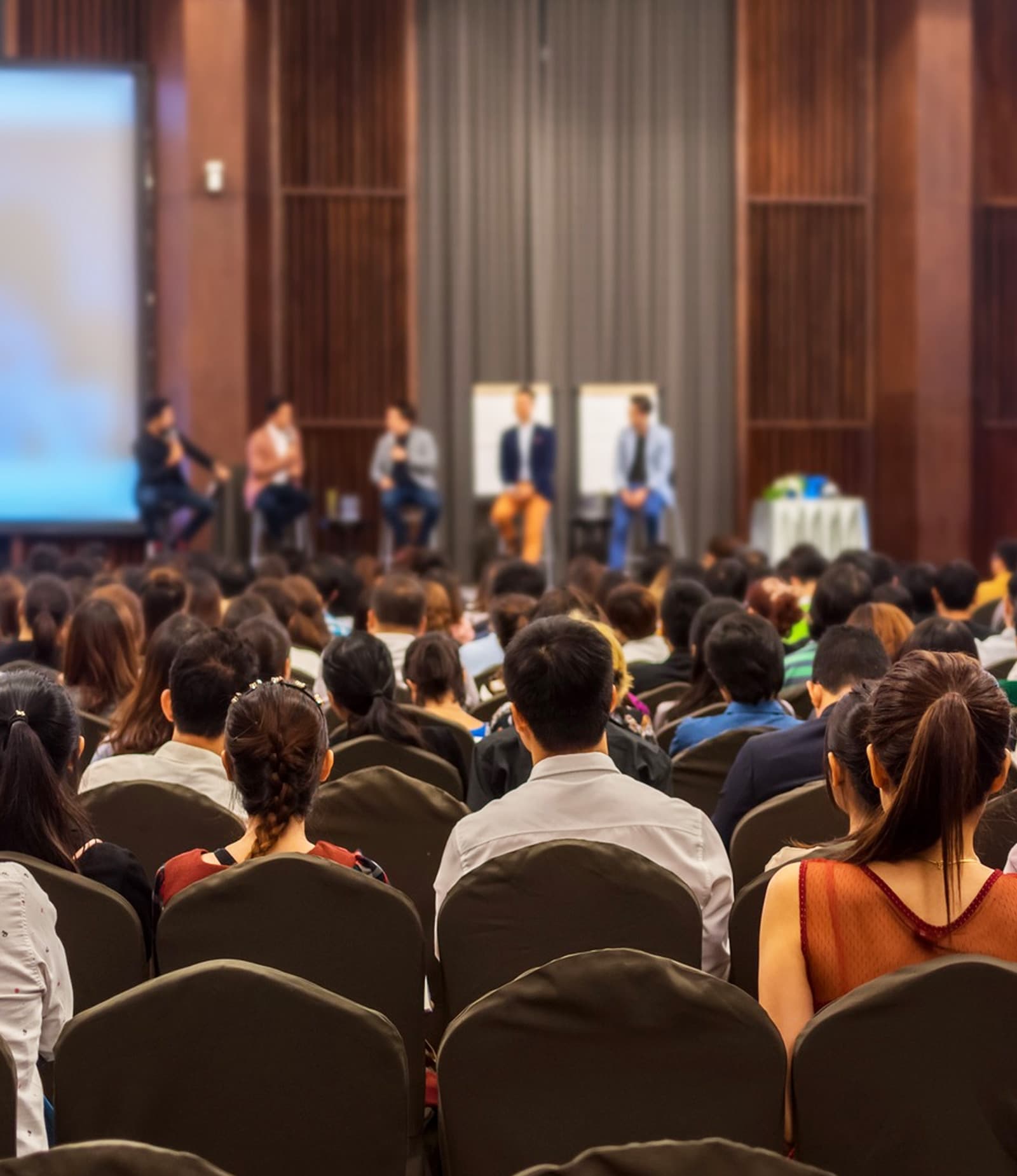 Audience seated for a Globus Events conference